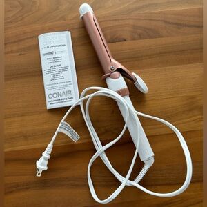 Conair Double Ceramic Curling Iron. Used once. New condition. Adjustable heat.